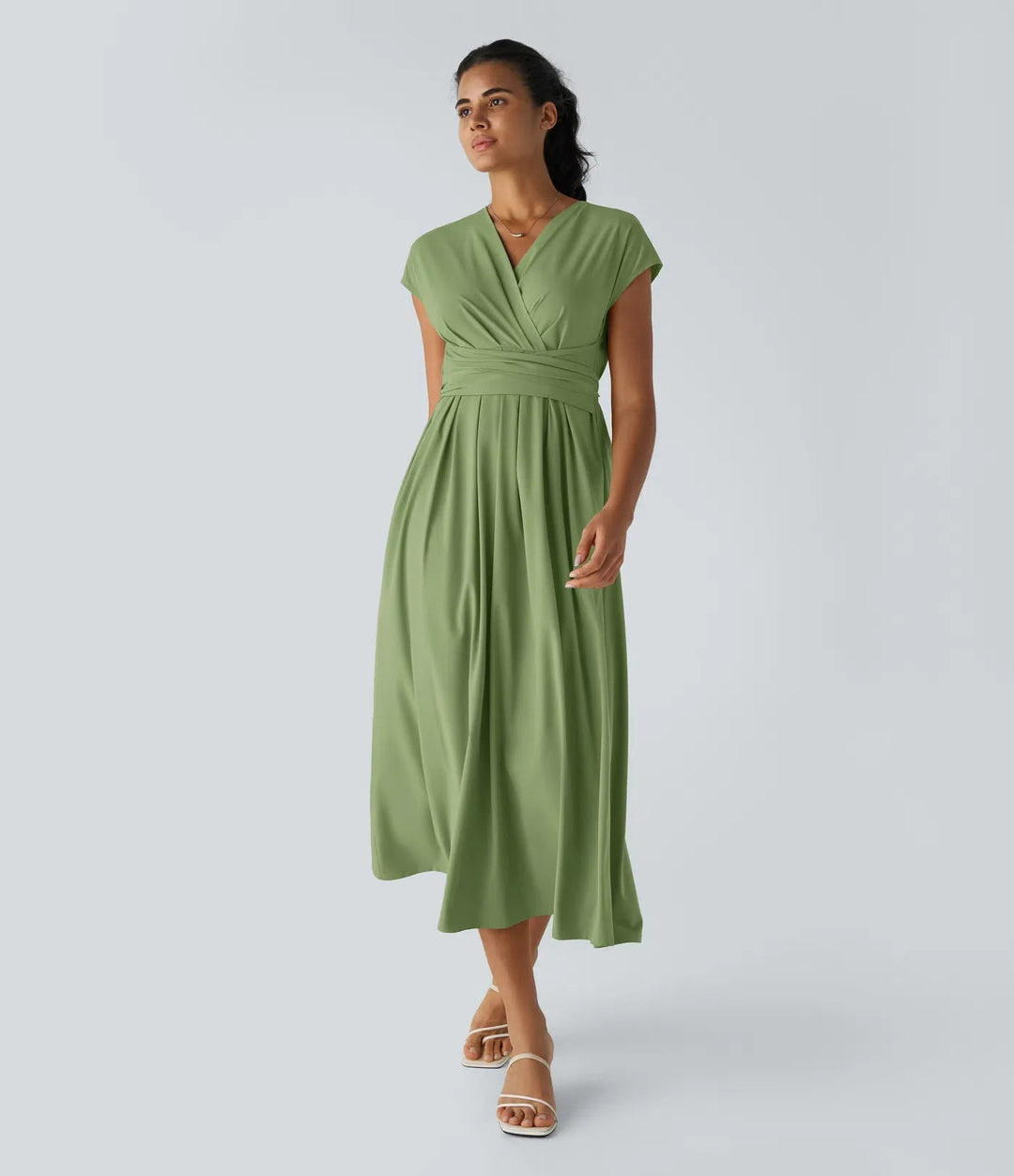 Chic women's short sleeve V-neck wrap midi dress. High waist design for a flattering, modern look.