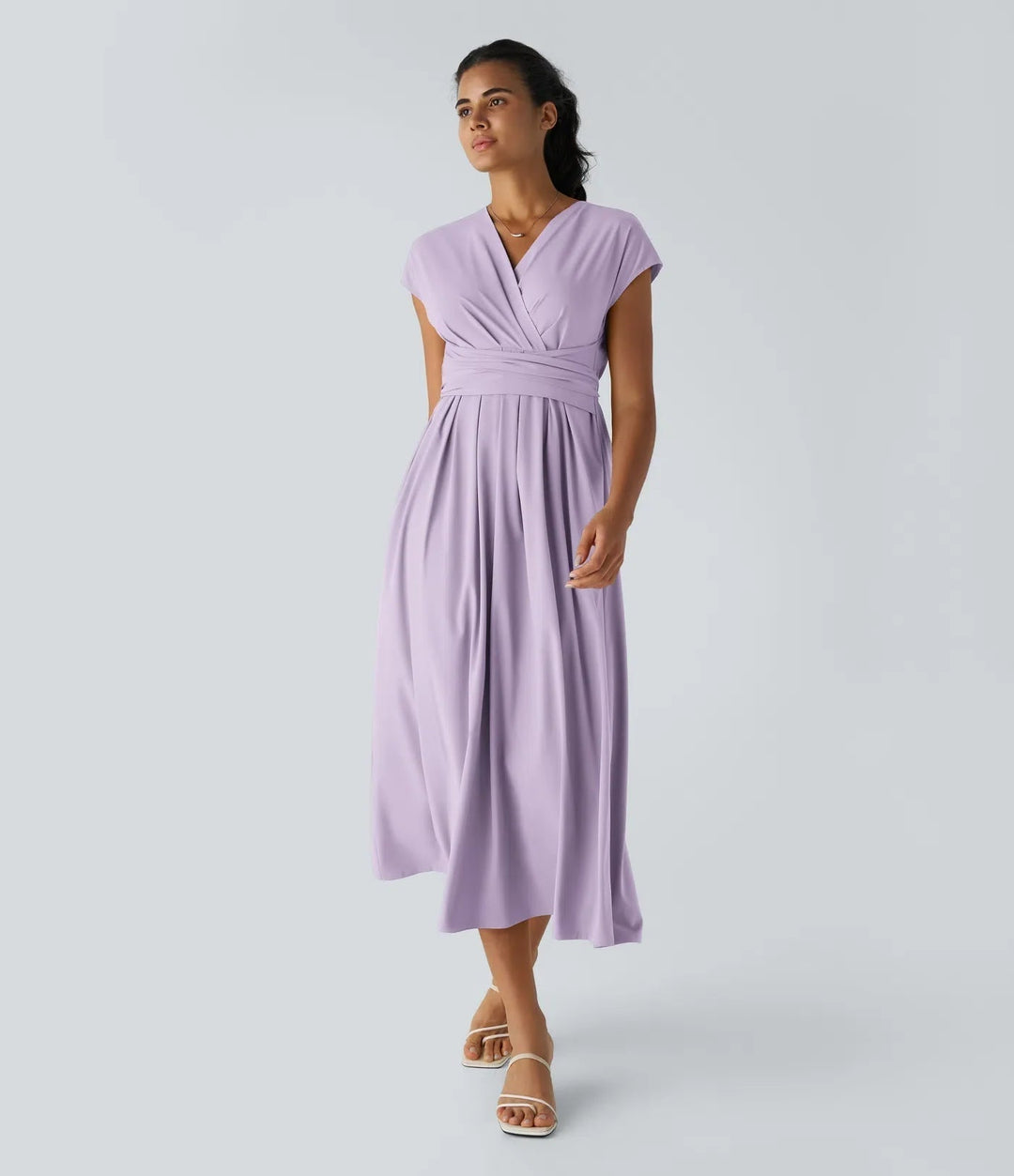 Classic women's wrap style midi dress with V-neck, short sleeves, and high waist. Ideal for elegant fashion.
