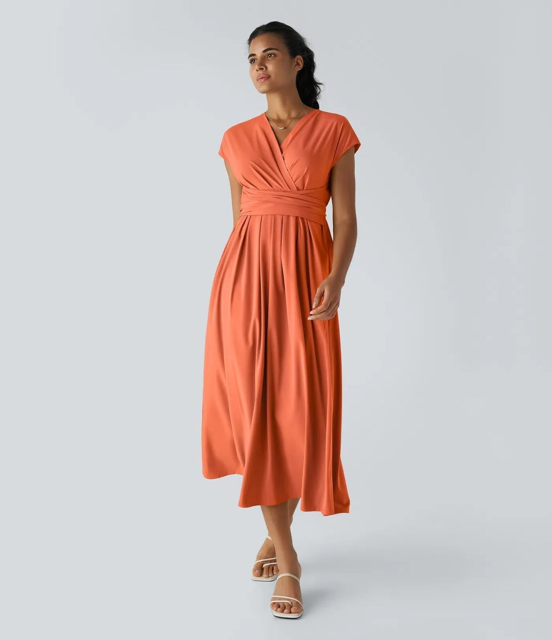 Comfortable women's V-neck wrap midi dress. Short sleeve, high waist. Great for everyday or special occasions.