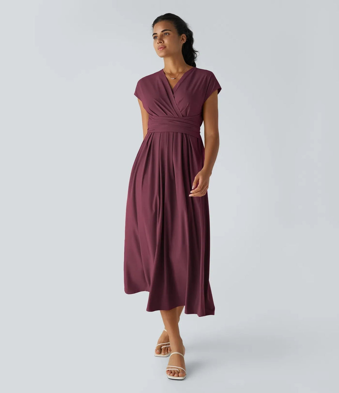 Stylish ladies wrap midi dress featuring a V-neck, short sleeves, and high waist. A flattering all-season design.