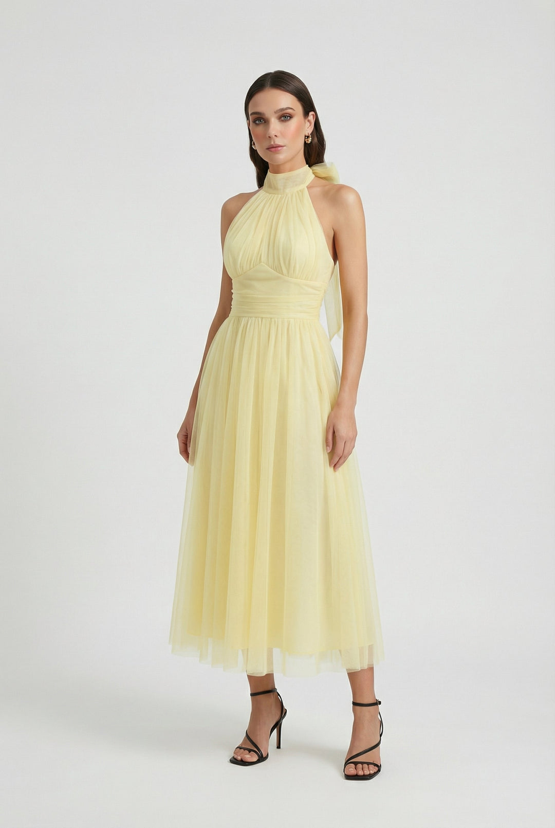 Women's elegant yellow high neck midi sleeveless dress, perfect for day to night wear.