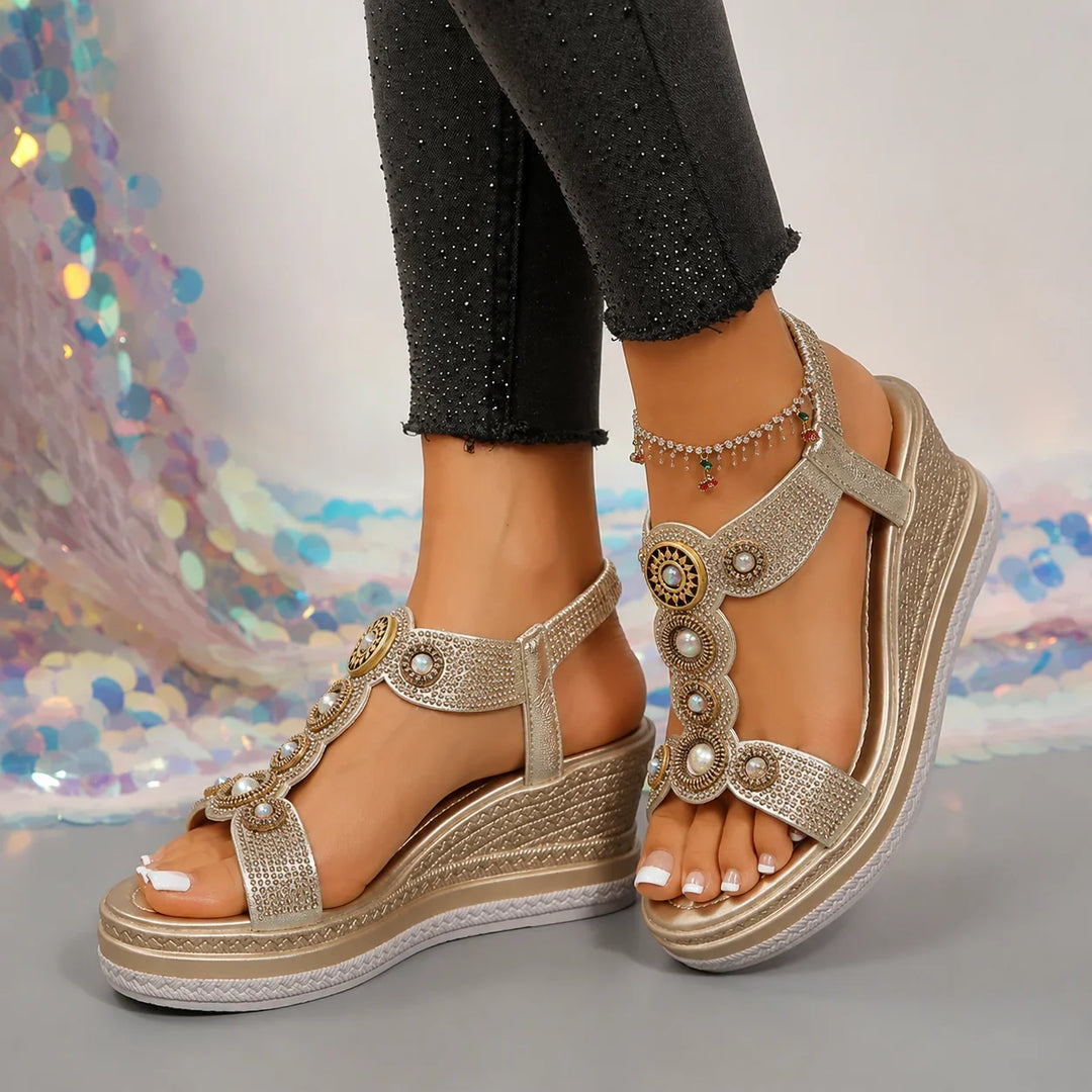 Sparkling women's embellished T-strap platform wedge sandals. Elegant footwear for summer parties.