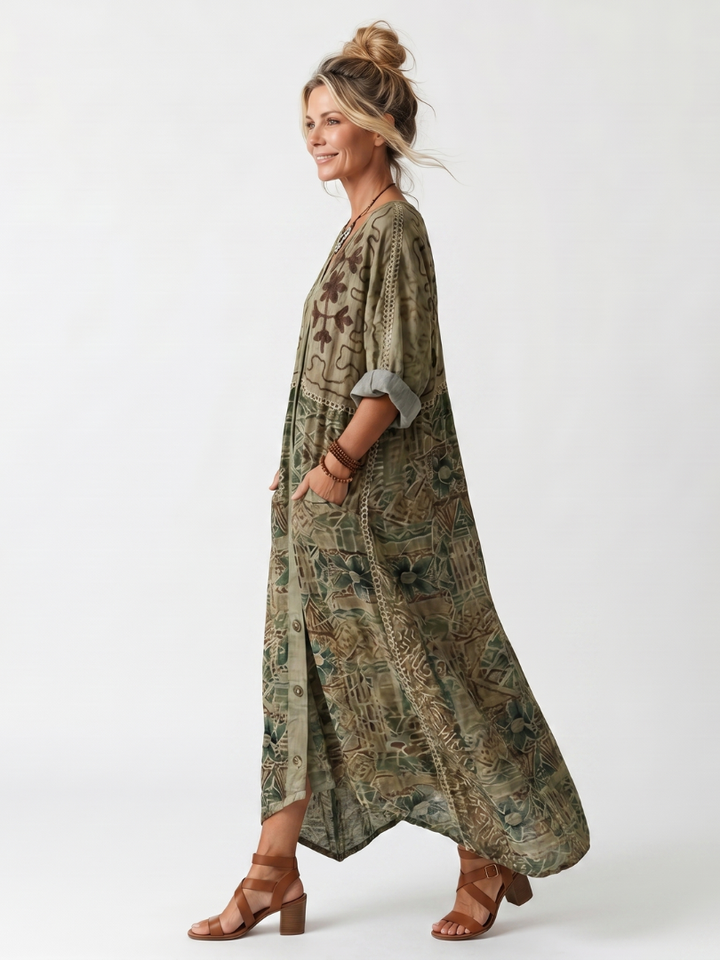 Comfortable oversized midi dress for women, featuring delicate embroidery and stylish button-front design.