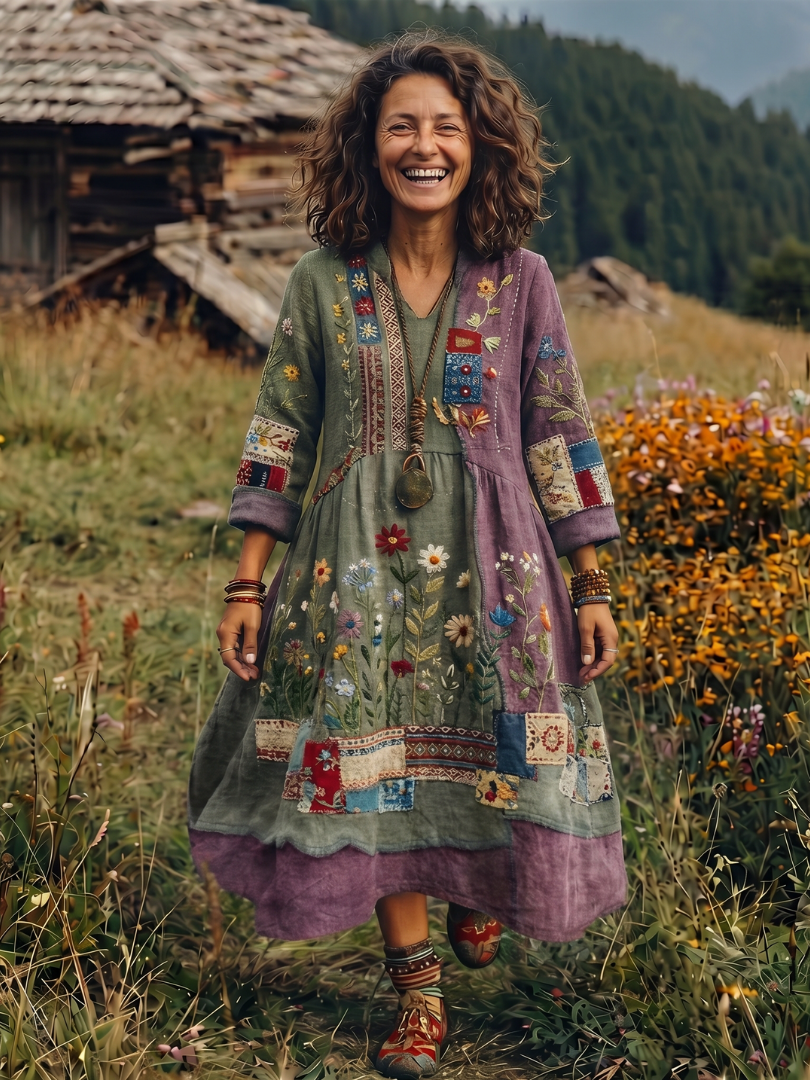 Detail of the long sleeves and embroidered cuffs of a women's comfortable, bohemian midi dress.
