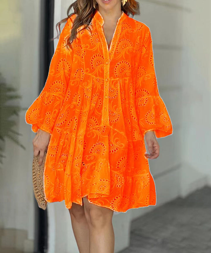 Casual women's button-front tiered mini dress with V-neck, delicate embroidery, and fashionable bell sleeves. Summer ready.