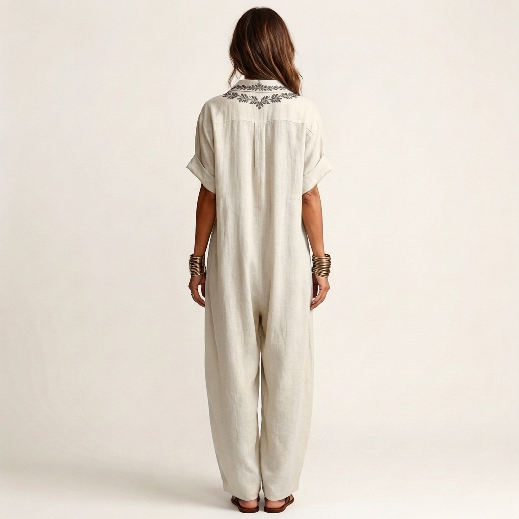 Flowy floral embroidered V-neck maxi dress for women, ideal casual summer or beach vacation wear.