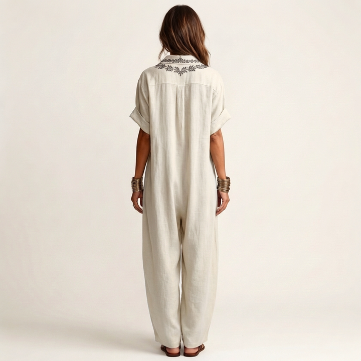 Flowy floral embroidered V-neck maxi dress for women, ideal casual summer or beach vacation wear.
