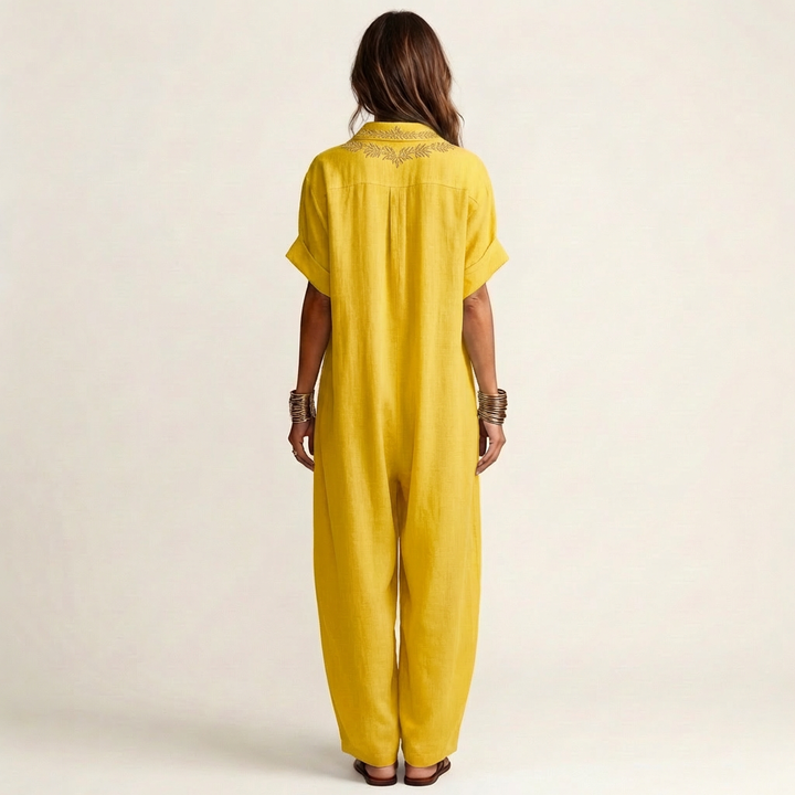 Relaxed fit women's V-neck maxi dress, featuring floral embroidery, perfect casual summer holiday wear.