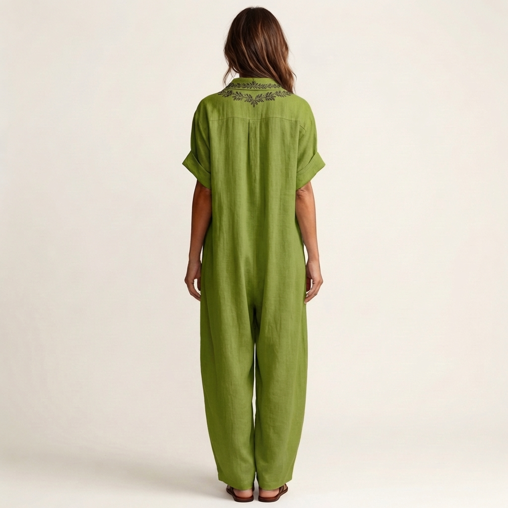 Boutique women's floral embroidered V-neck maxi dress, a long, flowy summer dress for elegant casual wear.
