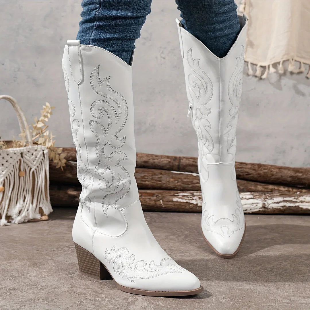 Womens tall embroidered western boots featuring a stable block heel and practical side zipper.