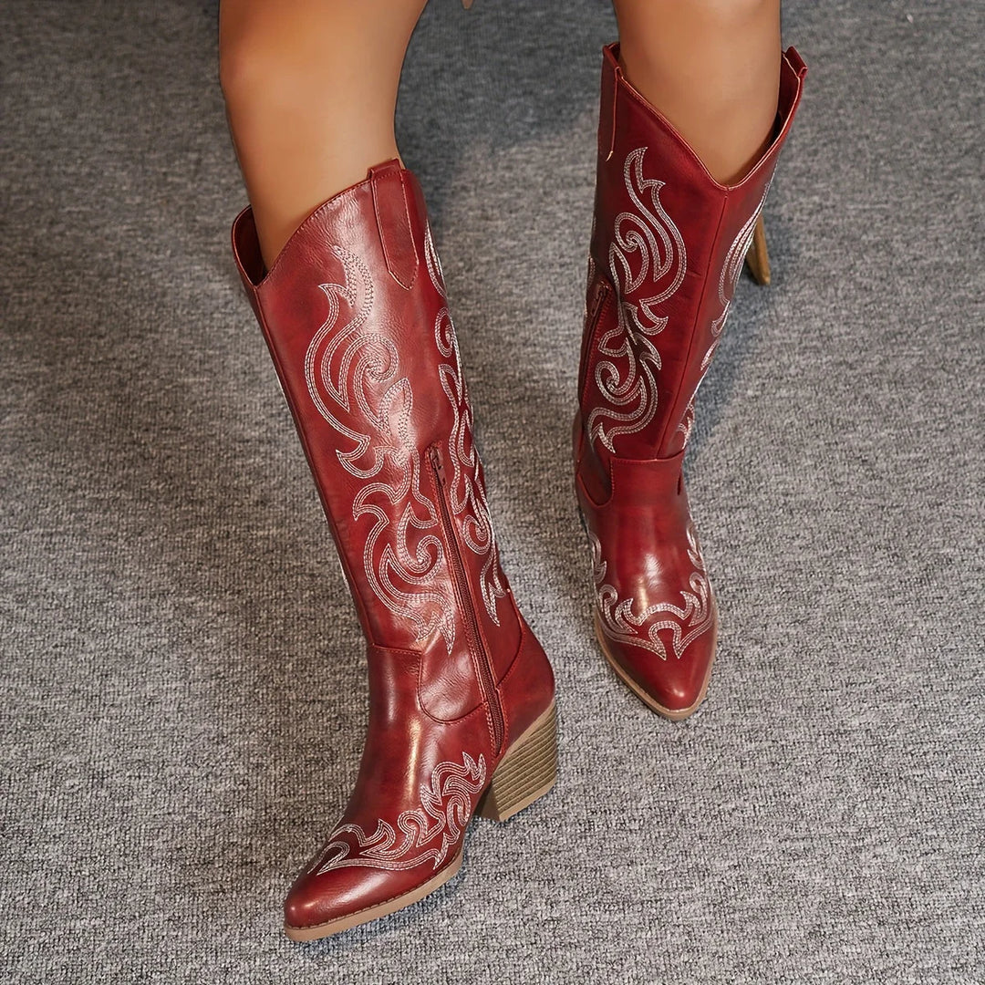 Women's knee-high western boots with easy side zipper, elegant embroidery, and a steady block heel.