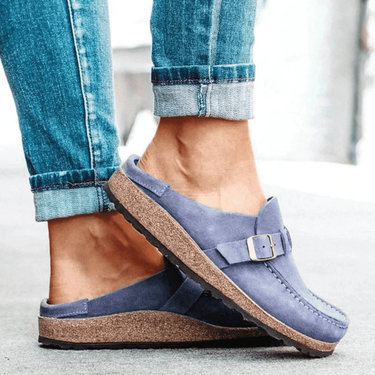 Slip-on women's clogs featuring an ergonomic design & comfortable cork sole for all-day support.
