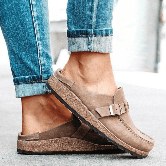 Casual women's flats: comfortable slip-on clogs with a supportive cork sole & adjustable fit.