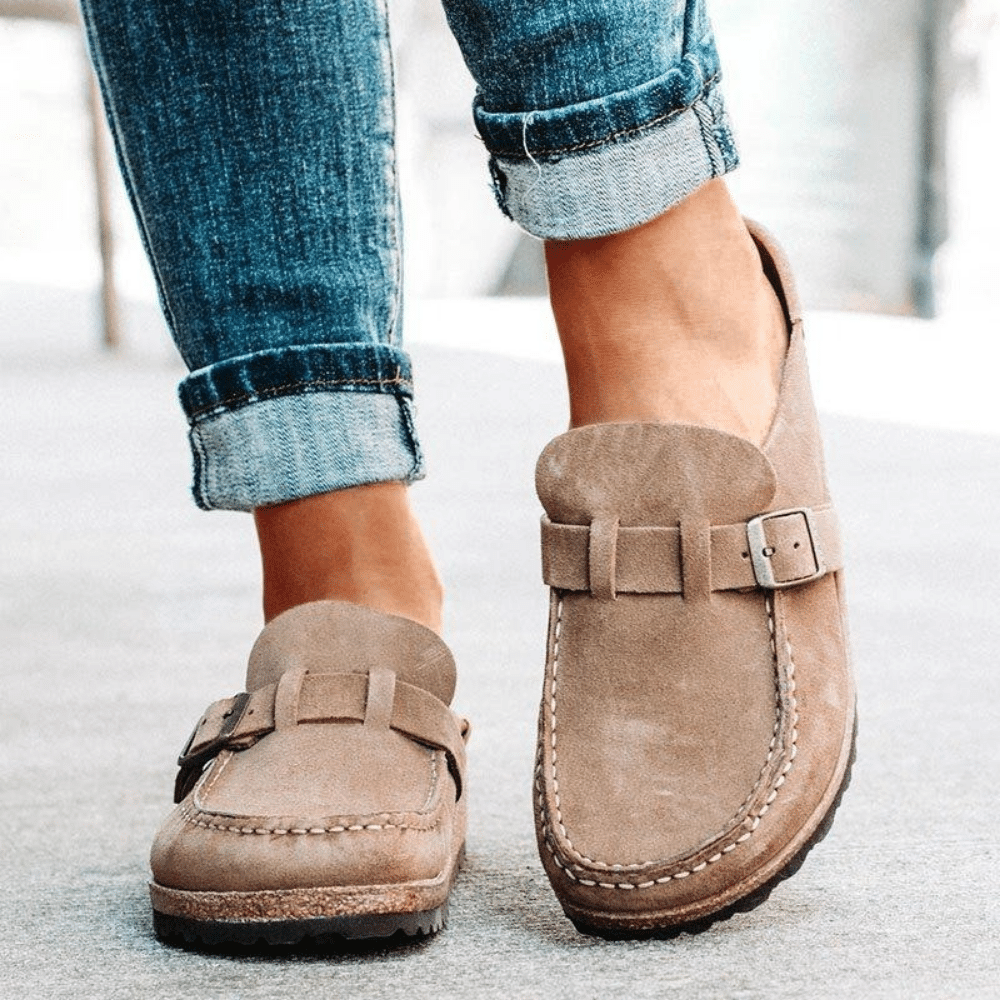 Ergonomic women's clogs with a durable cork sole, perfect for comfortable everyday casual wear.