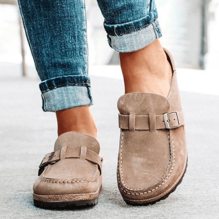 Ergonomic women's clogs with a durable cork sole, perfect for comfortable everyday casual wear.