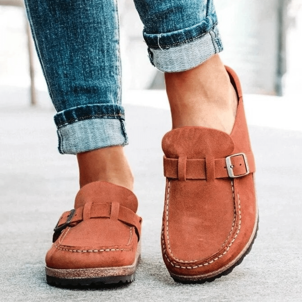Stylish women's comfort clogs, designed for easy slip-on wear with an orthopedic cork sole.