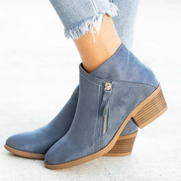 Stylish brown leather boots for women, designed for all-day comfort and fashion.