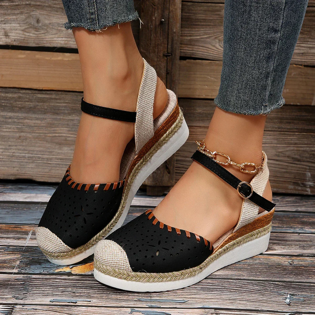 Chic women's espadrille wedge sandals with comfortable closed-toe design & adjustable ankle strap.