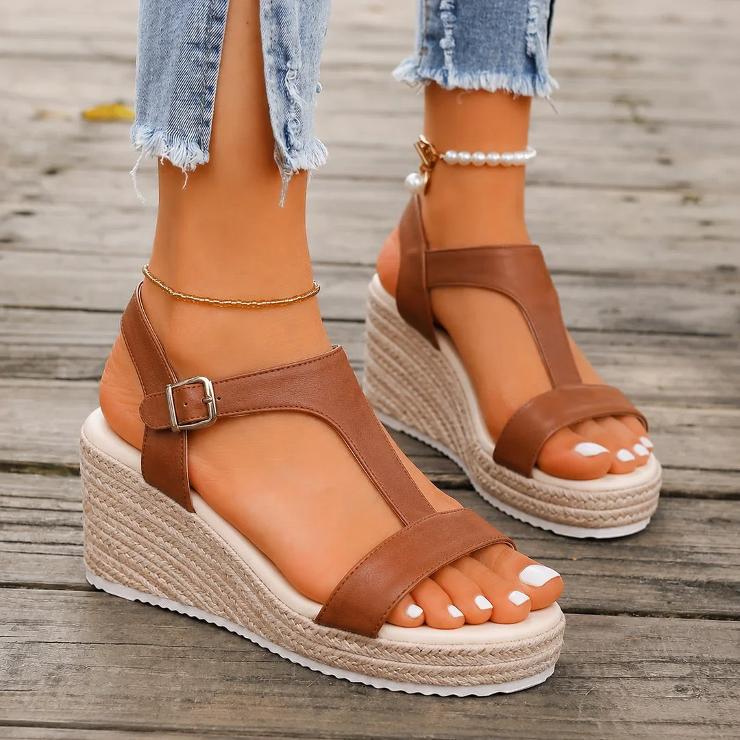 Back view of women's comfortable espadrille wedge sandals, showcasing the secure buckle ankle strap.