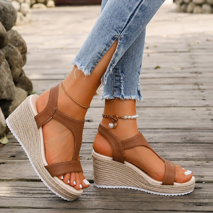 Dressy yet casual women's espadrille wedge T-strap sandals with buckle, ideal for summer comfort.