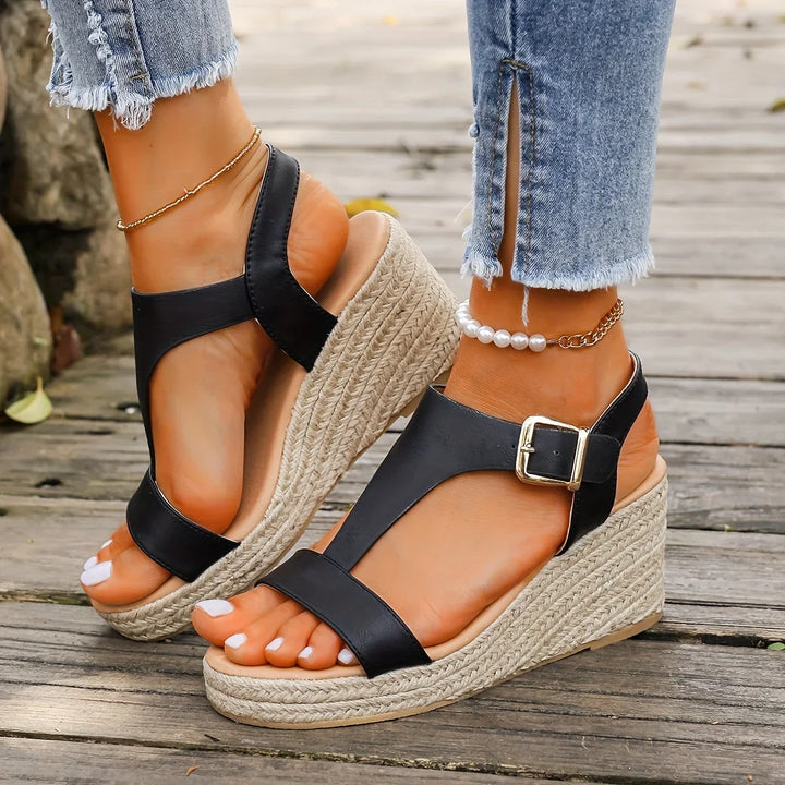 Chic espadrille wedge sandals for women, a comfortable and stylish T-strap design with buckle ankle.