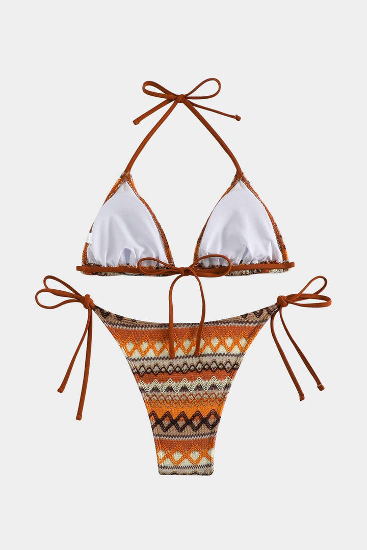 Bohemian women's triangle bikini set with unique ethnic print, stylish summer beachwear for your next vacation.