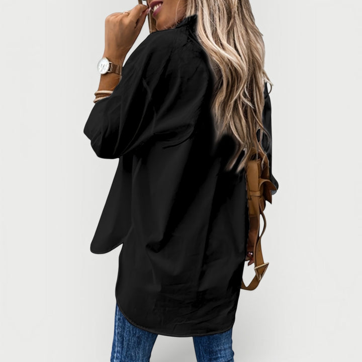 Comfortable women's long-sleeve button-up blouse. Collared, relaxed fit, perfect for daily casual & office fashion.