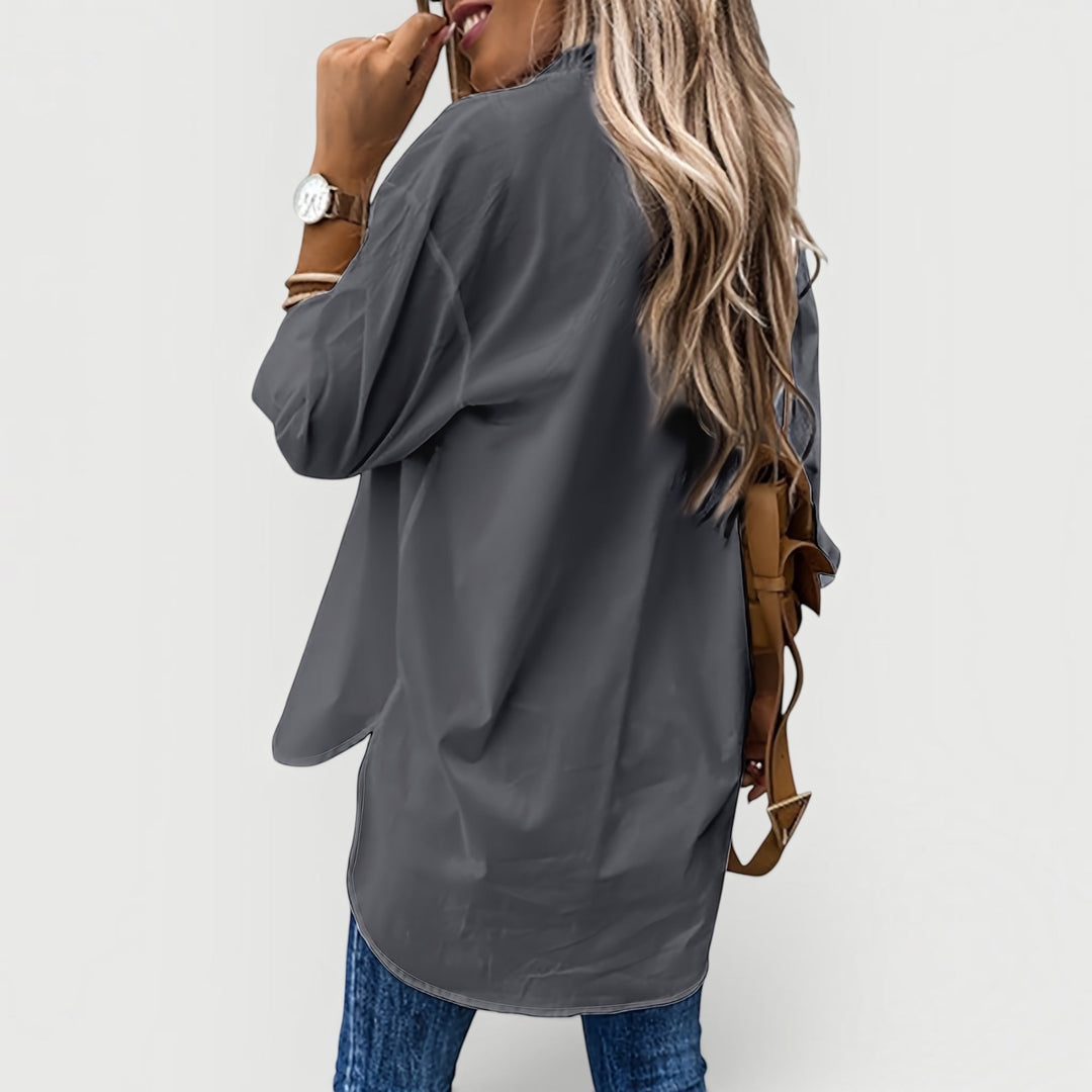 Collared button-up blouse for women. Comfortable long-sleeve top, perfect for casual, office & daily fashion.