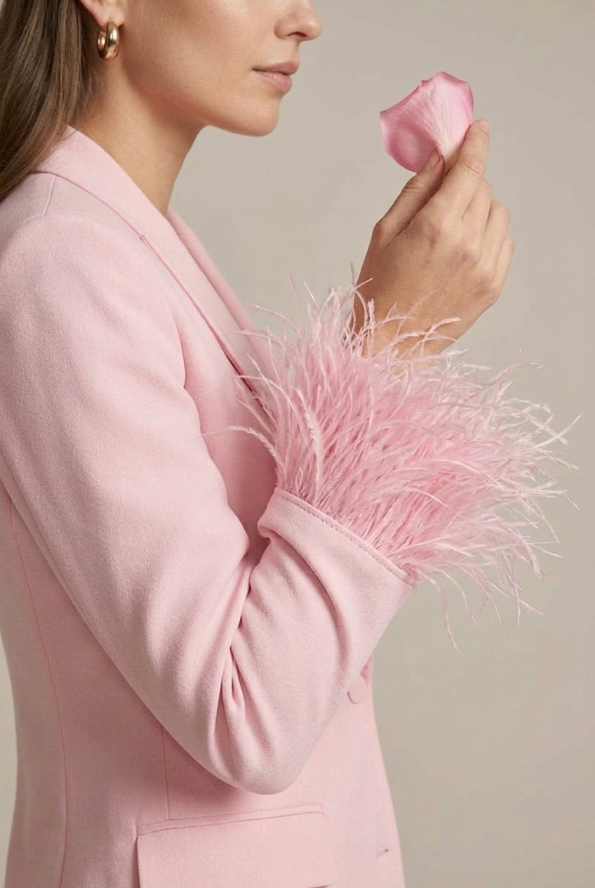 Unique women's blazer set featuring chic feather cuffs & straight leg pants. Perfect for an evening ensemble.