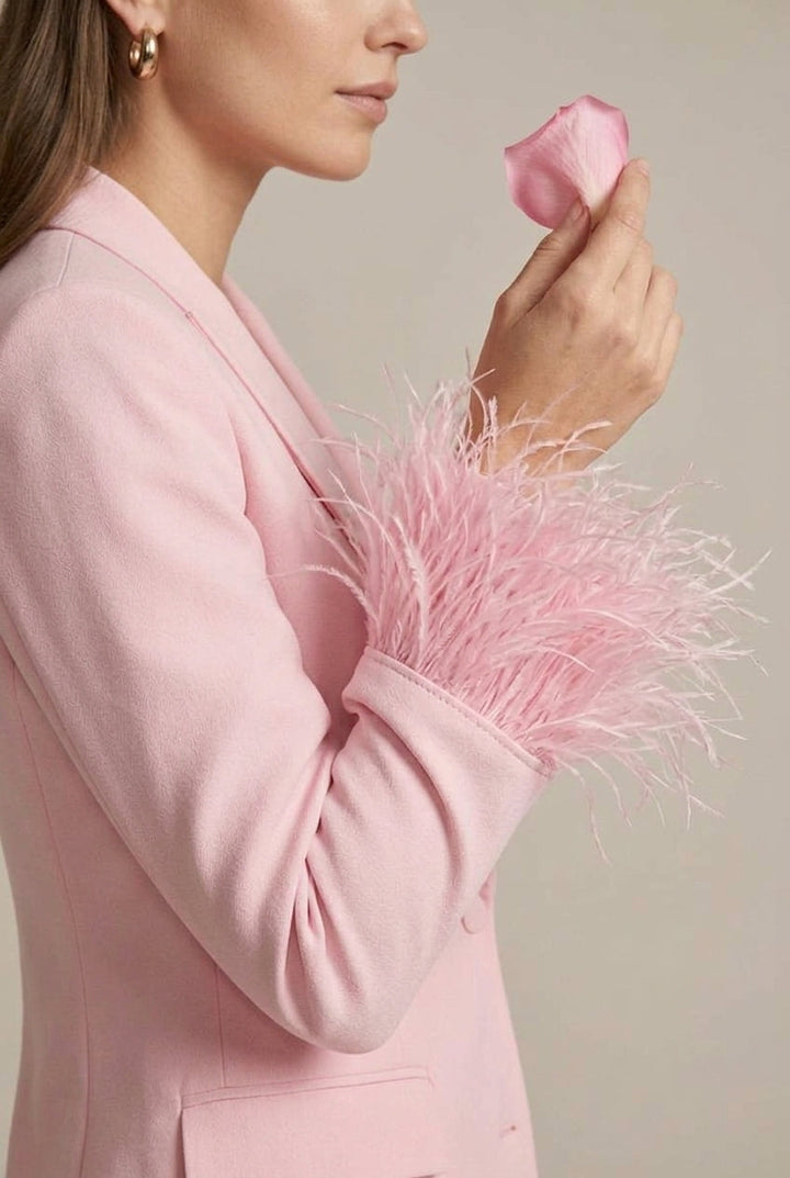 Unique women's blazer set featuring chic feather cuffs & straight leg pants. Perfect for an evening ensemble.