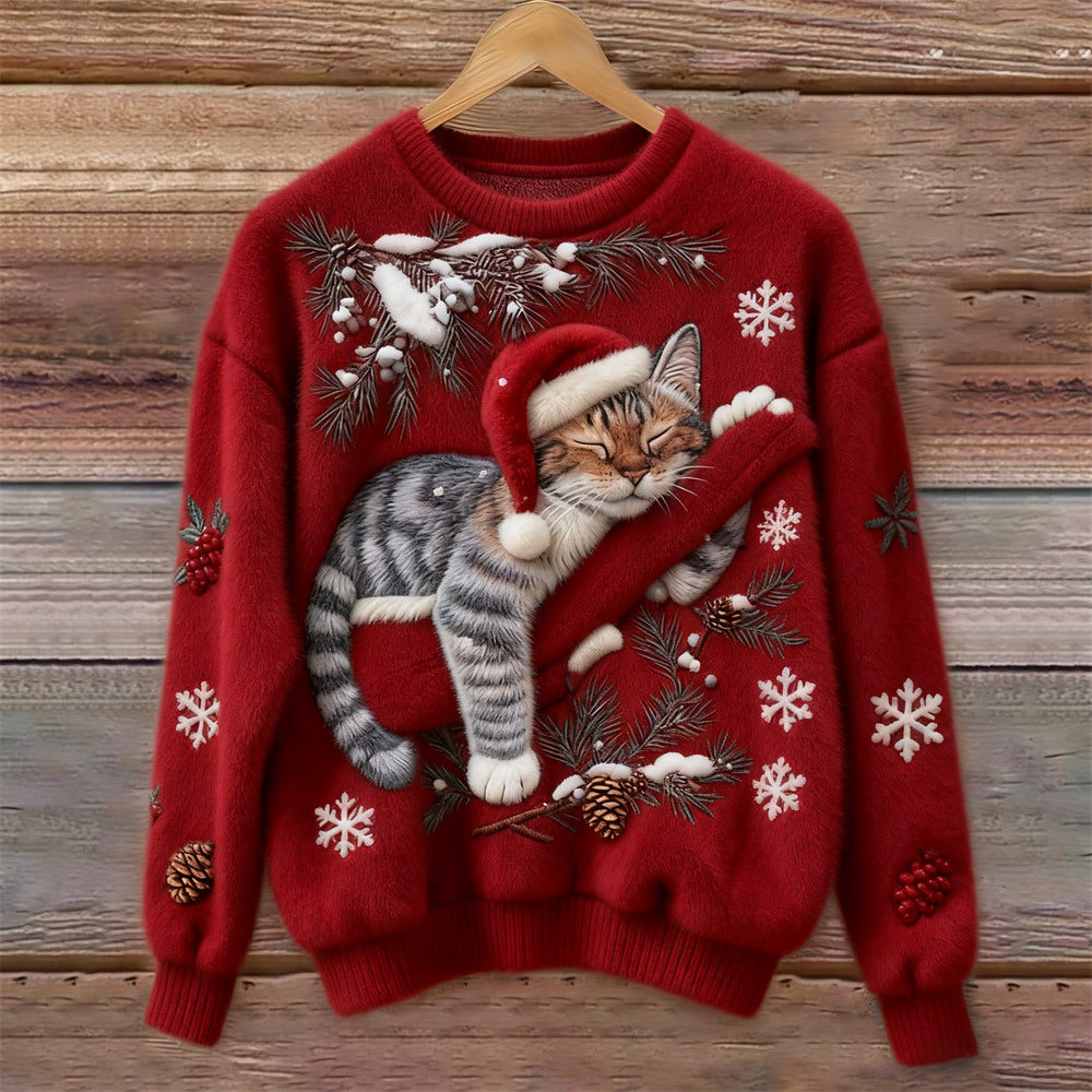 Women's relaxed fit graphic sweater featuring a charming festive cat print, great for casual holiday wear.