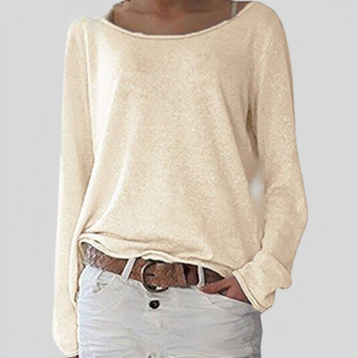 Close-up of the delicate fine knit texture on a women's round neck long sleeve sweater.