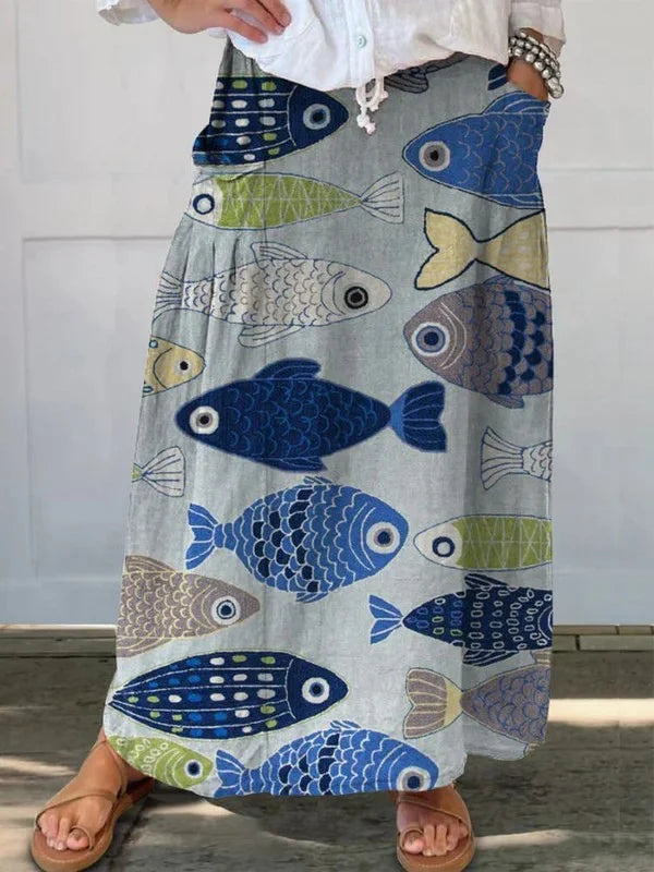 Women's fish print loose fit maxi skirt with drawstring waist & pockets for casual summer or bohemian style.