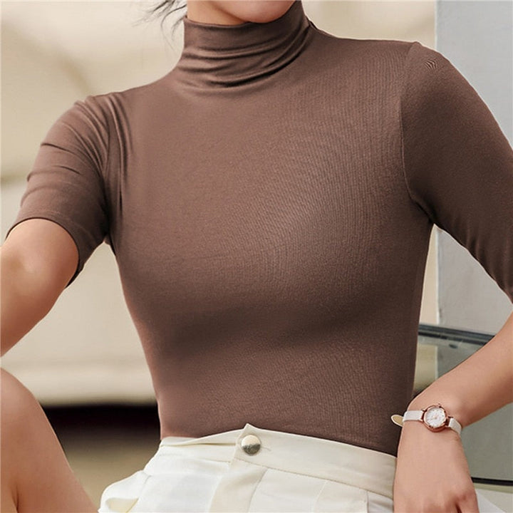 Fashionable women's elbow sleeve turtleneck, a fitted top for women. Ideal for layering & elegant styling.