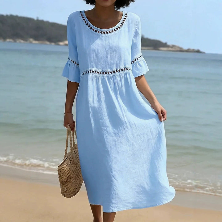 Elegant women's casual midi dress with flared sleeves & hollow out detail. Comfortable summer fashion.