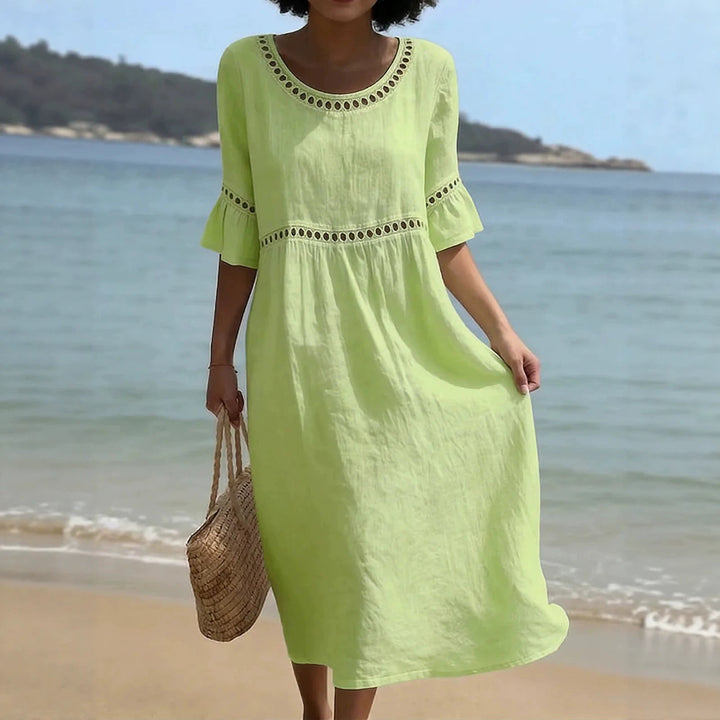 Versatile women's midi dress with flared sleeves & hollow out design, ideal for summer vacation & casual outings.