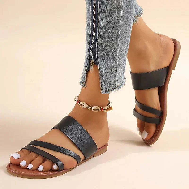 Everyday women's comfortable flat sandals, cushioned multi-strap, open-toe slip-on for versatile style.