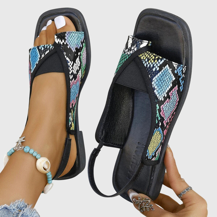 Everyday women's flat slingback sandals. Offers all-day comfort with a fashionable contrast trim for any outfit.