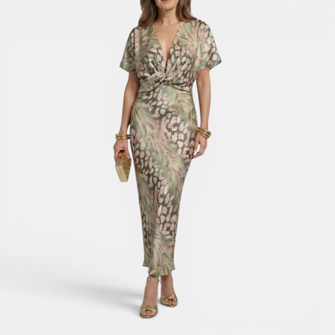 Versatile women's summer midi dress in apricot, featuring a flattering defined waist design.