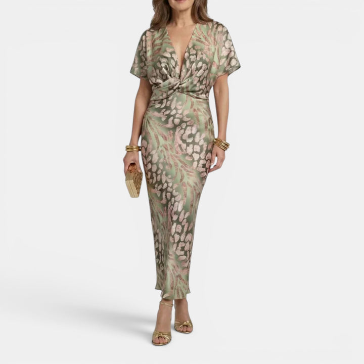 Versatile women's summer midi dress in apricot, featuring a flattering defined waist design.