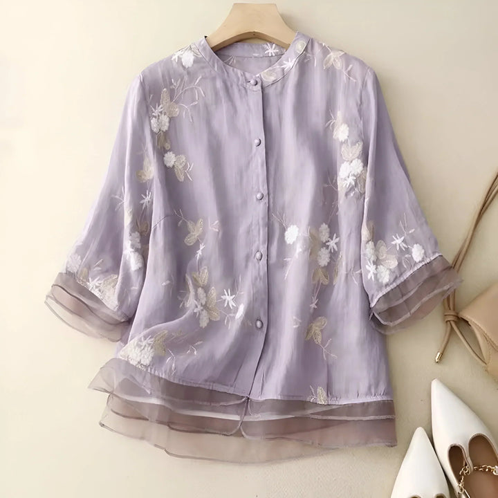 Cream embroidered women's blouse, an elegant and flattering top suitable for spring and summer casual style.