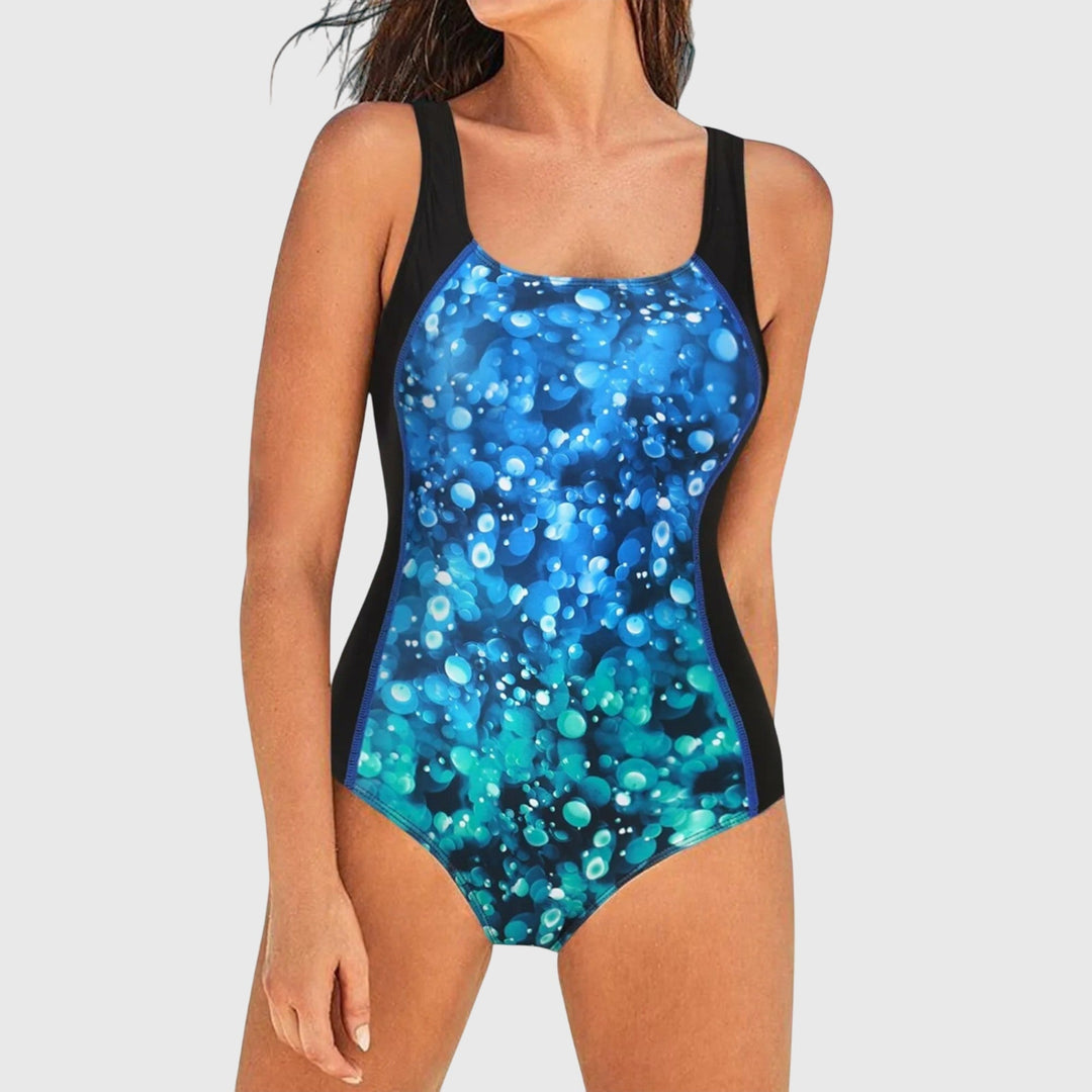 Women's flattering printed one-piece swimsuit, offers shaping support for stylish summer beach days.