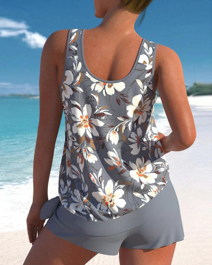 Comfortable women's 2-piece tankini swimwear with adjustable V-neck top & modest boyshorts. Great for summer beach.