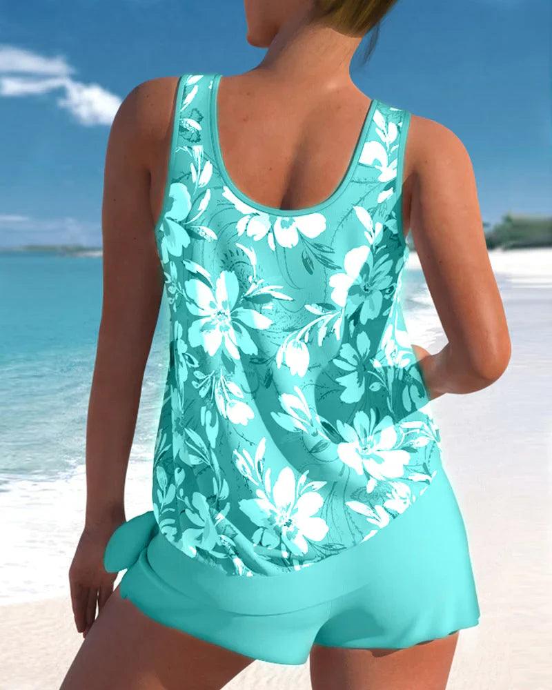 Flattering women's tankini set with V-neck top & modest boyshorts. Stylish two-piece swimwear for summer vacation.