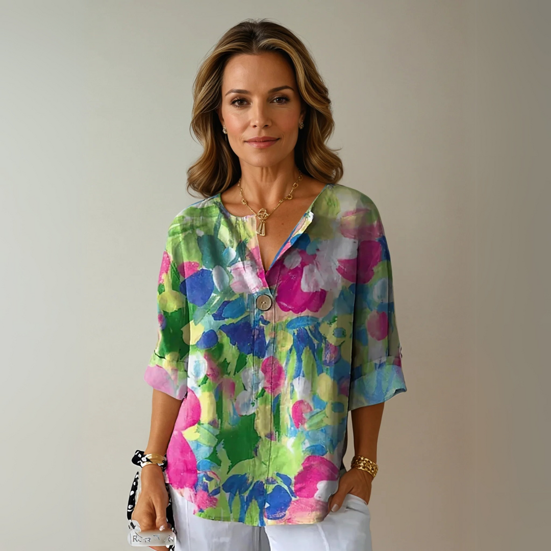 Comfortable women's floral 3/4 sleeve top, ideal for spring and summer casual wear or elegant occasions.