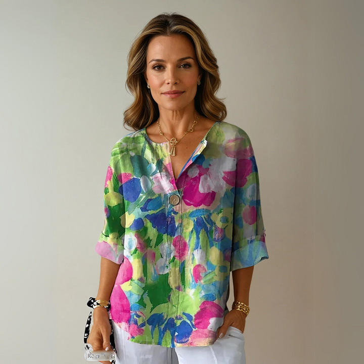Comfortable women's floral 3/4 sleeve top, ideal for spring and summer casual wear or elegant occasions.