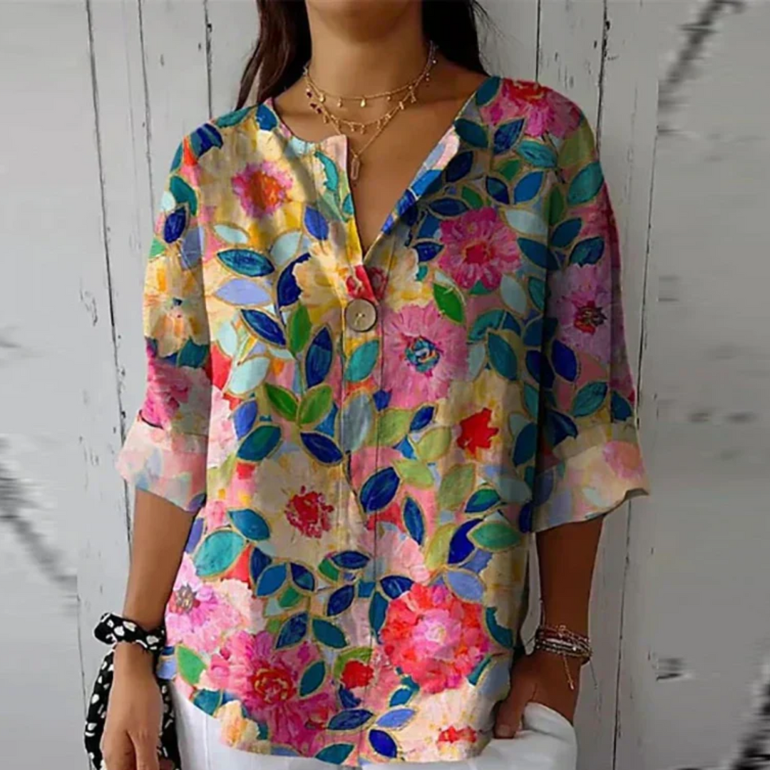 Stylish women's floral 3/4 sleeve blouse, an elegant and versatile choice for spring and summer fashion.