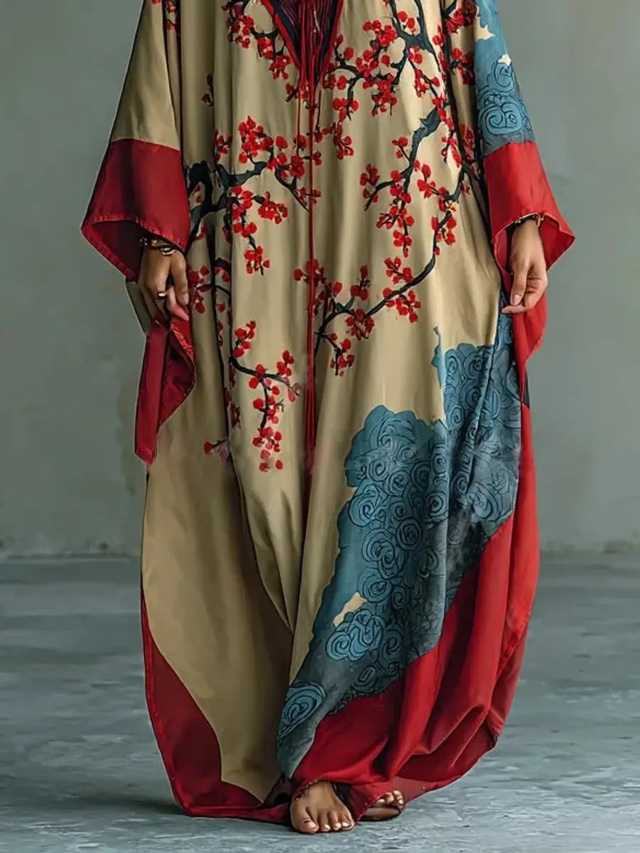 Elegant women's floral batwing maxi dress with a flowing kimono style, ideal for stylish comfort and versatile wear.