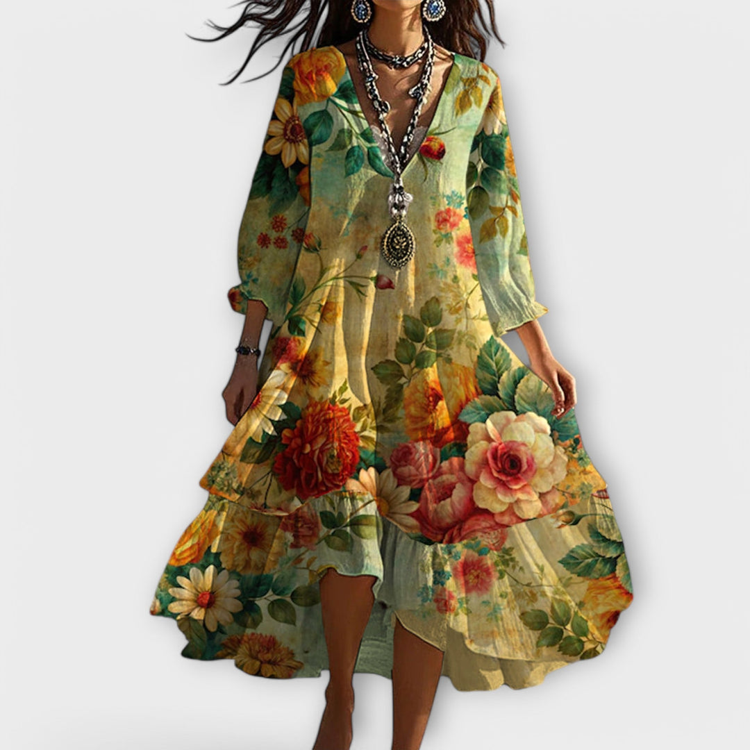 Women's floral bohemian maxi dress, perfect for summer. Features a flowy design, long length, and elegant print.