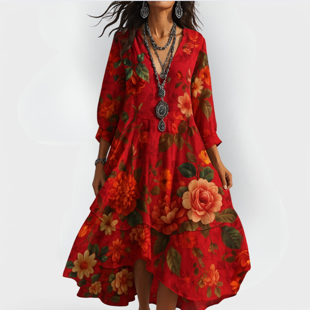 Flowing women's floral tiered maxi dress with long sleeves & V-neck, ideal for summer or fall occasion wear.